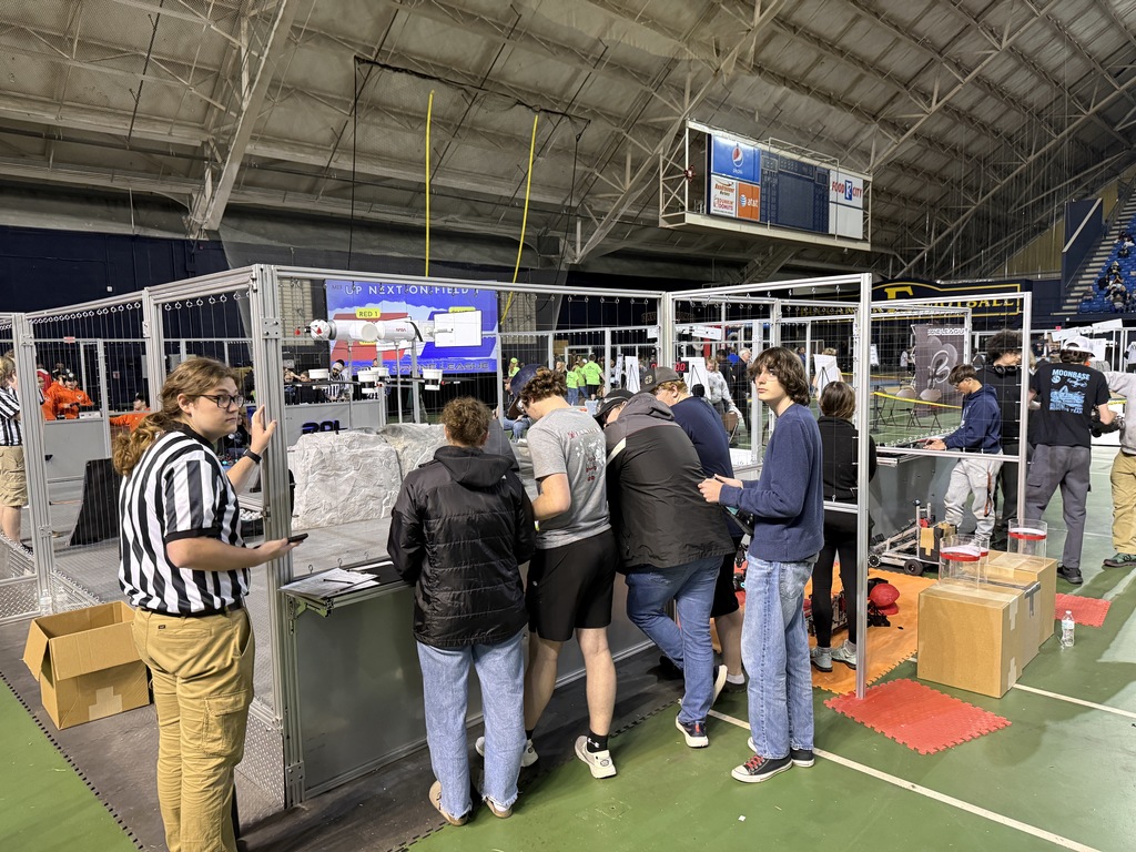 Students compete in a robotics competition.