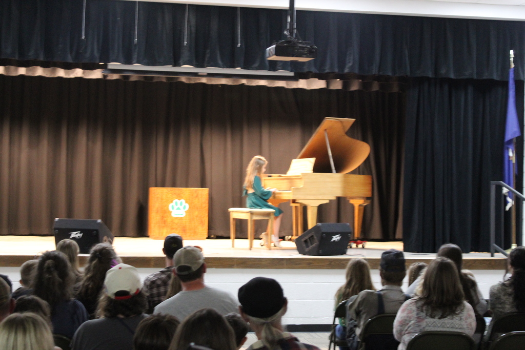 student playing piano