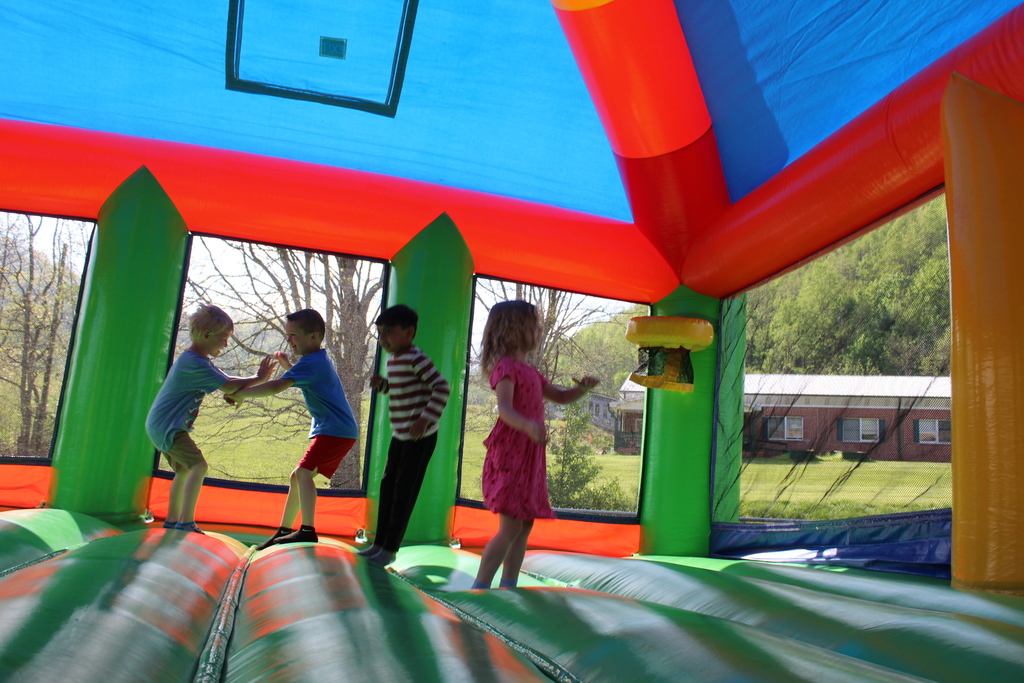 students in bounce house