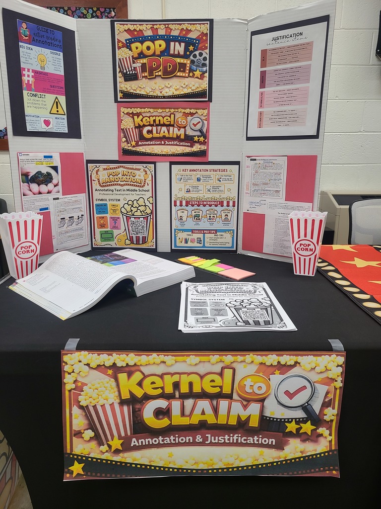 A Kernel to Claim posterboard is on display for a Professional Development session.