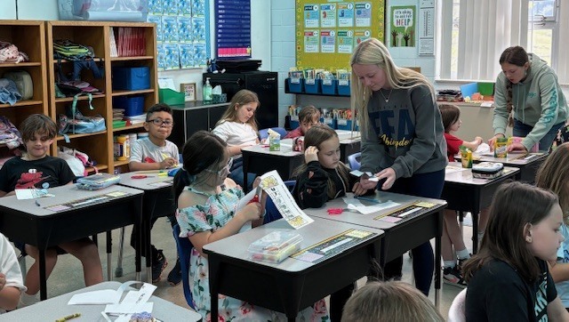Second Graders enjoyed spending time with AHS FFA members at the Food for America event last week.