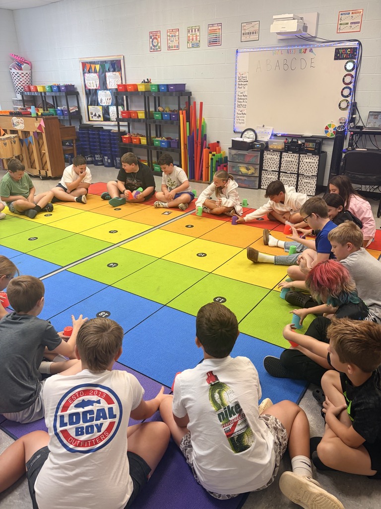 Mrs. Jones class keeping a steady beat together as they perform a cup routine to the song “El Capitan” by John Philip Sousa.