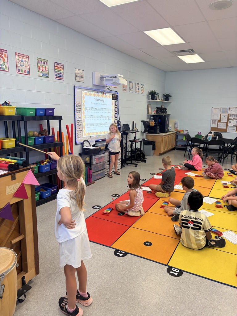 Students in Mrs. Persiani’s class learning to sing the song “ Rico’s Pizza Restaurant” and using the glockenspiels to accompany the song.
