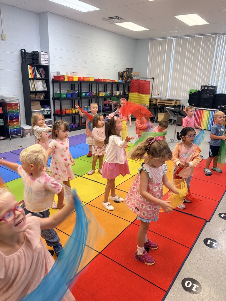 Mrs. Deel’s class using scarves to move with the music.