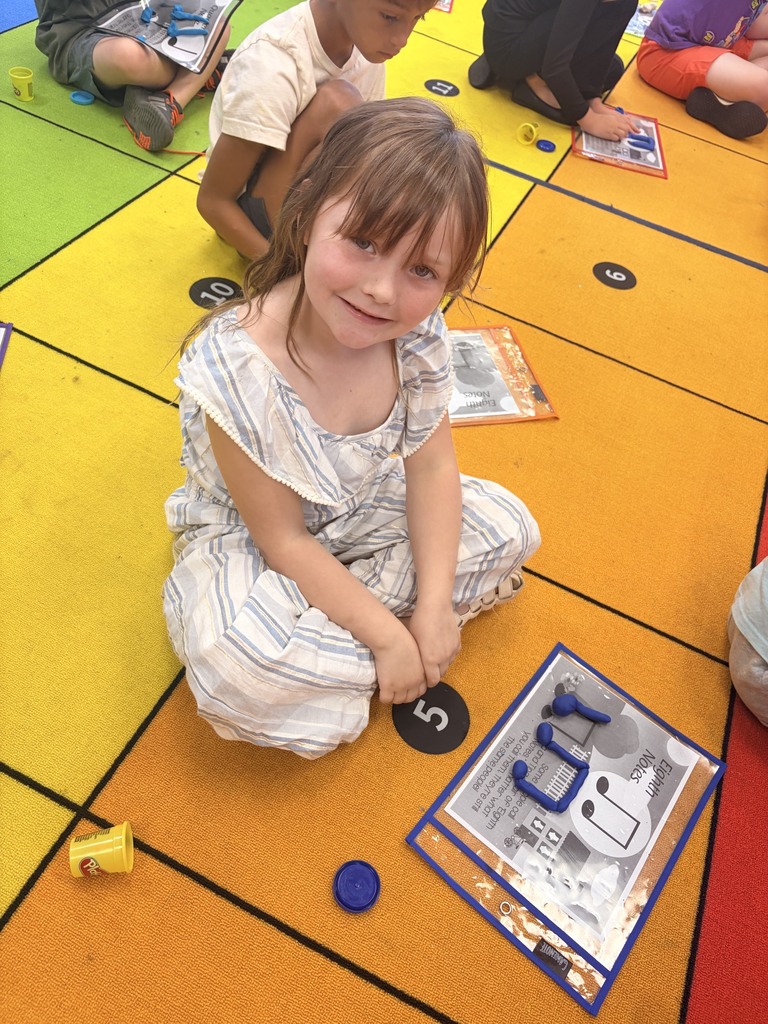 1st grade students in Ms. Nunleys class making Quarter Notes and Eighth Notes with playdoh.