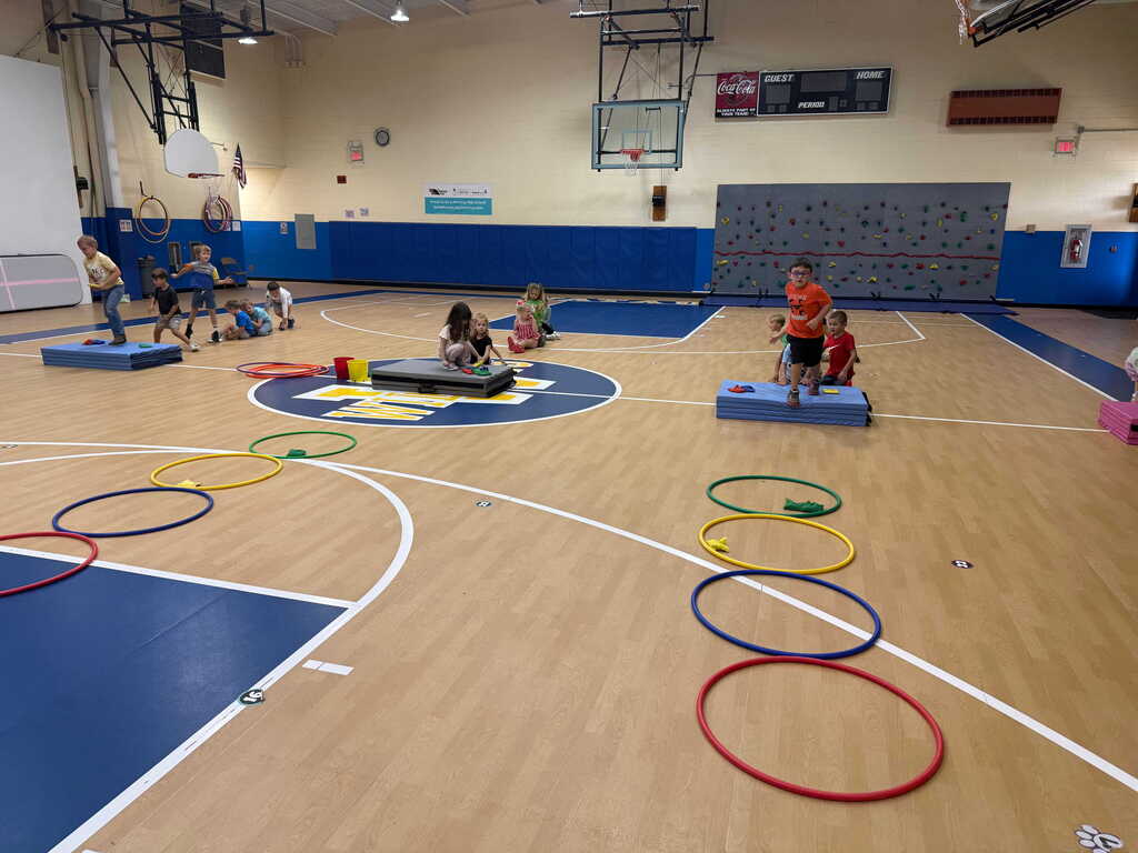 Students in Kindergarten and First Grade have been playing "Toss, Match and Move" in PE.