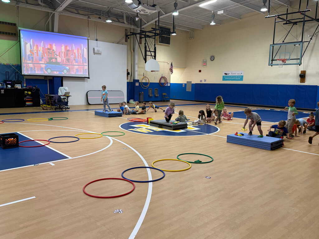 Students in Kindergarten and First Grade have been playing "Toss, Match and Move" in PE.