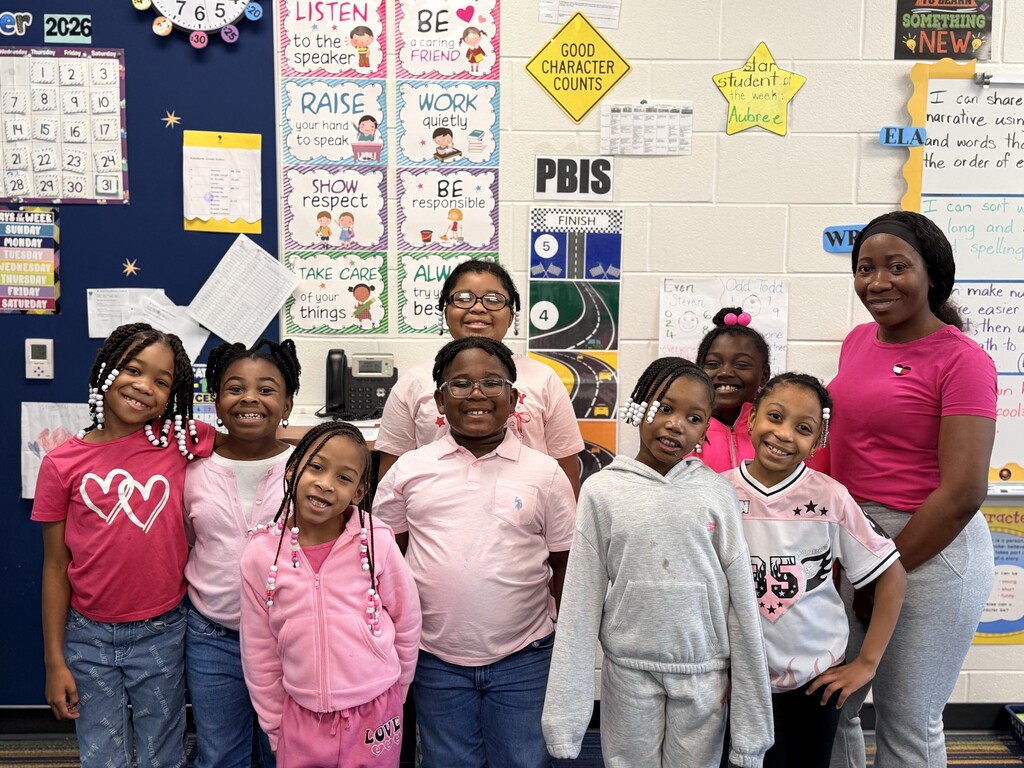 Mrs. Bennett-Francis and her 2nd Graders in pink