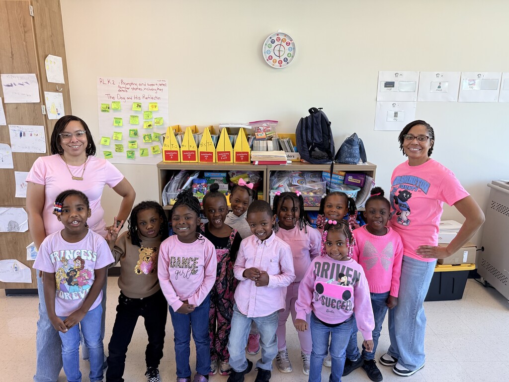Ms. Gallop and Ms. Norman's Kindergarten class in their pink.