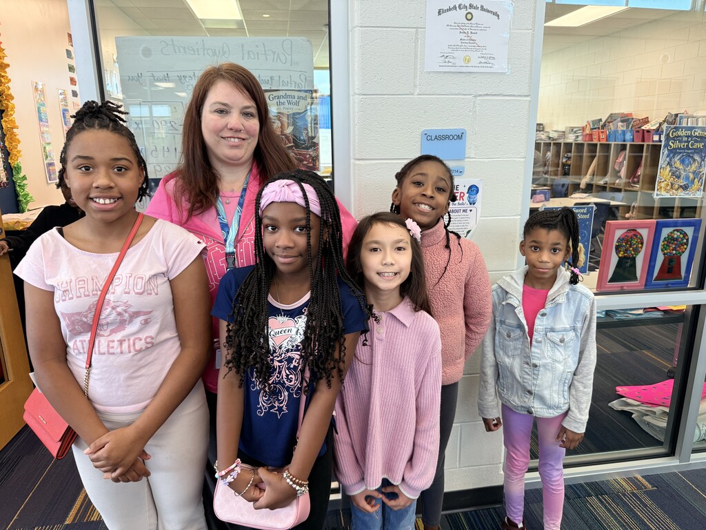 Ms. Bennett's 4th Grade class with Mrs. Keller all wearing pink.