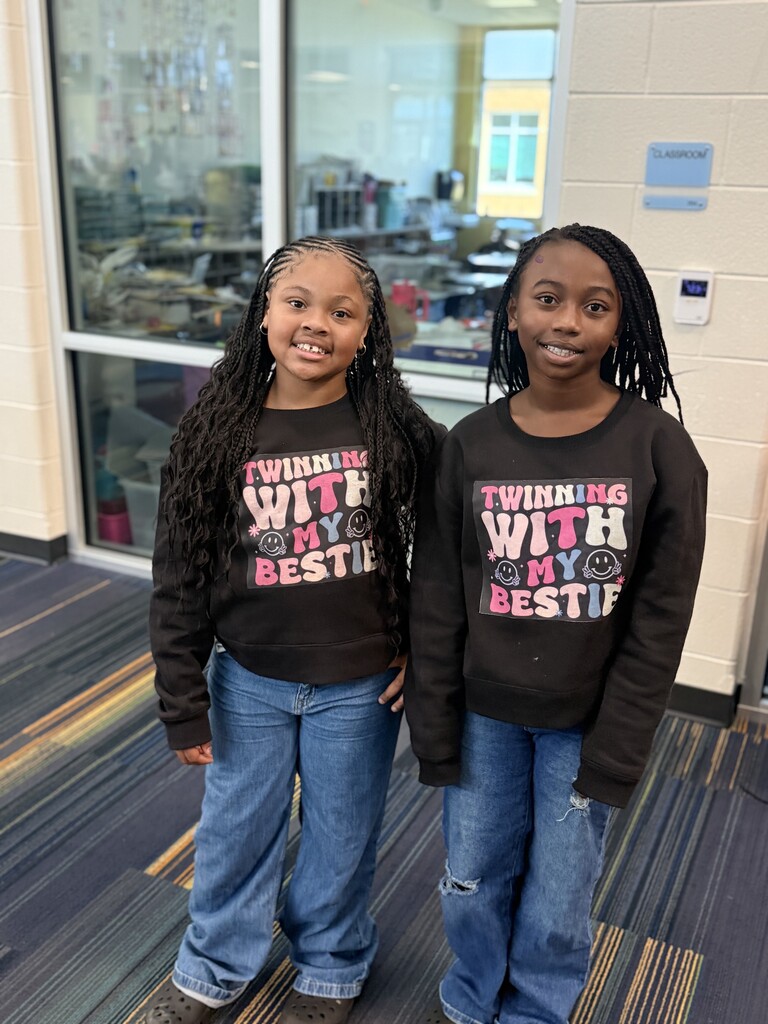 2 students wearing twinning with my bestie sweaters.