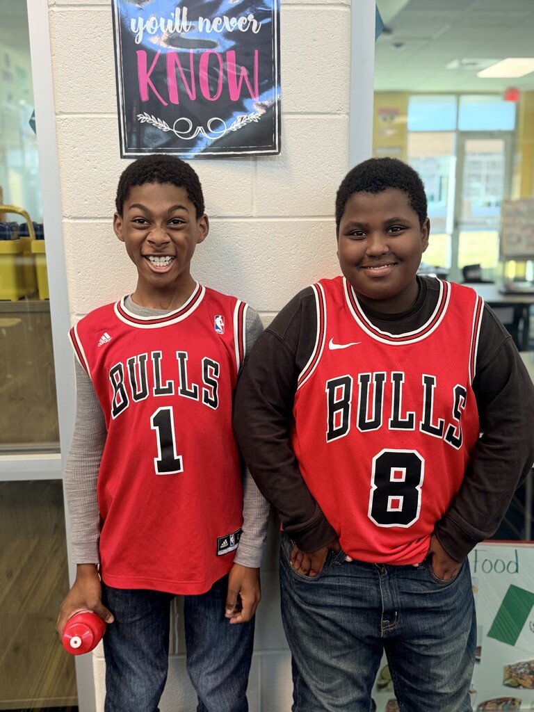 2 students wearing Chicago Bull jerseys
