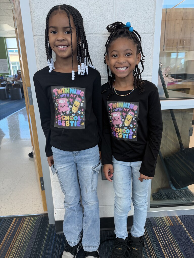 2 students wearing twinning with my school bestie shirts and jeans