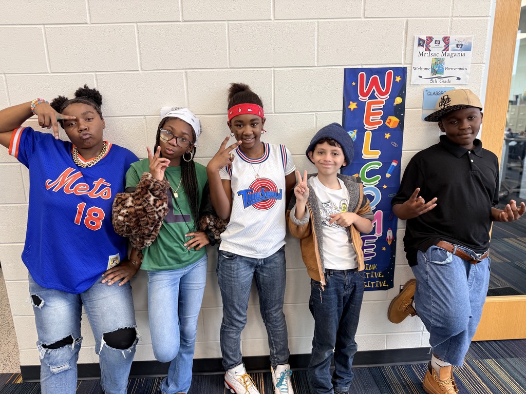 5 students headed back in time with peace signs.