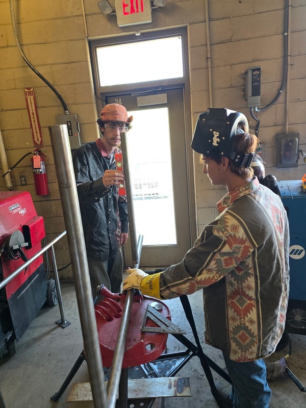 Welding class builds the bars