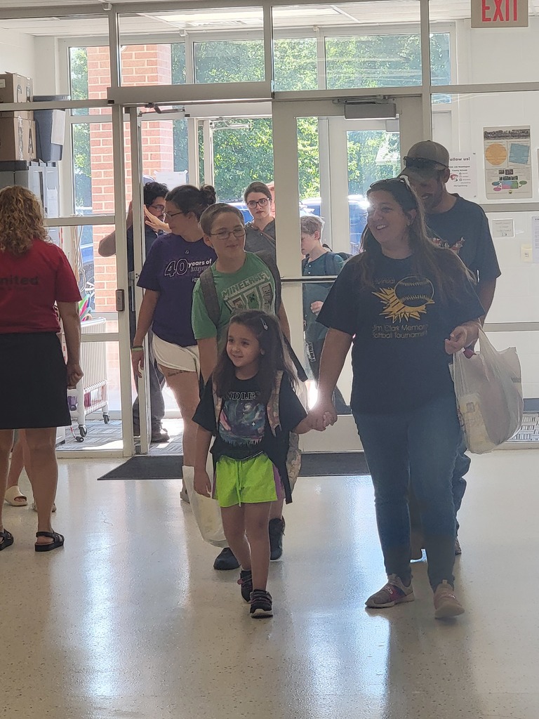 Students and families coming in the doors for Open House