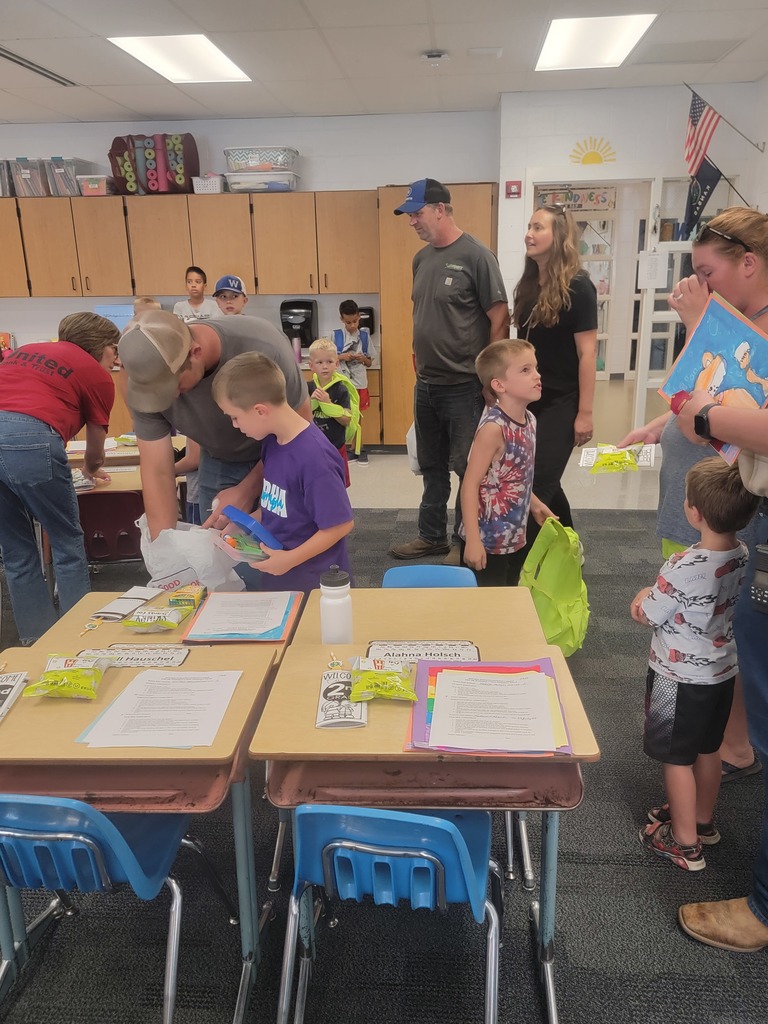 Students and families visiting classrooms