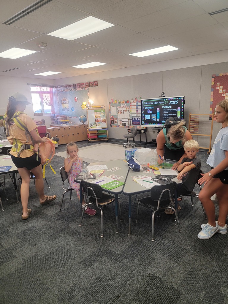 Students and families visiting classrooms