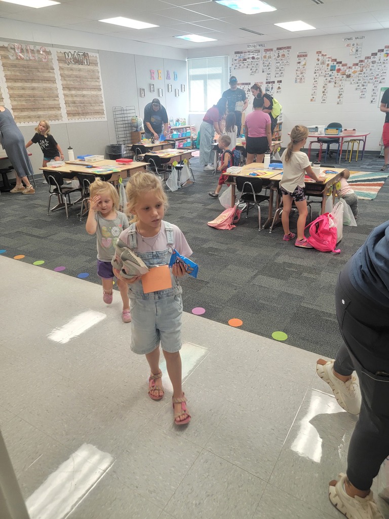 Students and families visiting classrooms