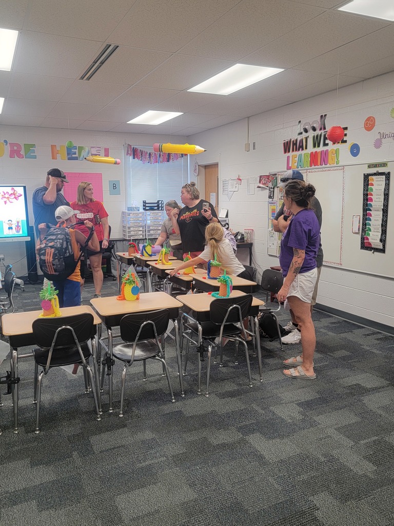 Students and families visiting classrooms