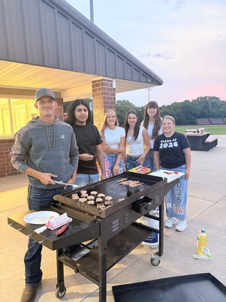 Seniors grilling for breakfast at Senior Sunrise