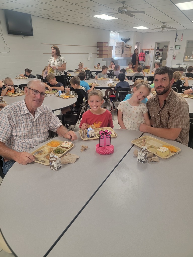 September birthday students enjoying a birthday meal with family and friends.