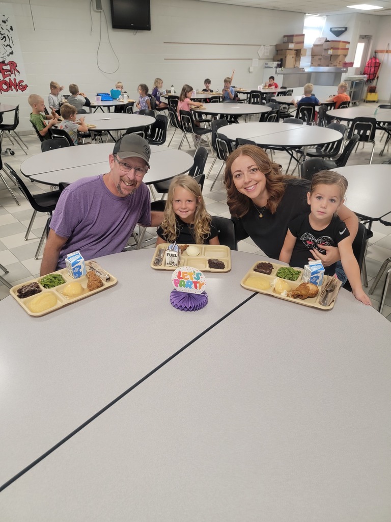 October birthday students with family and friends
