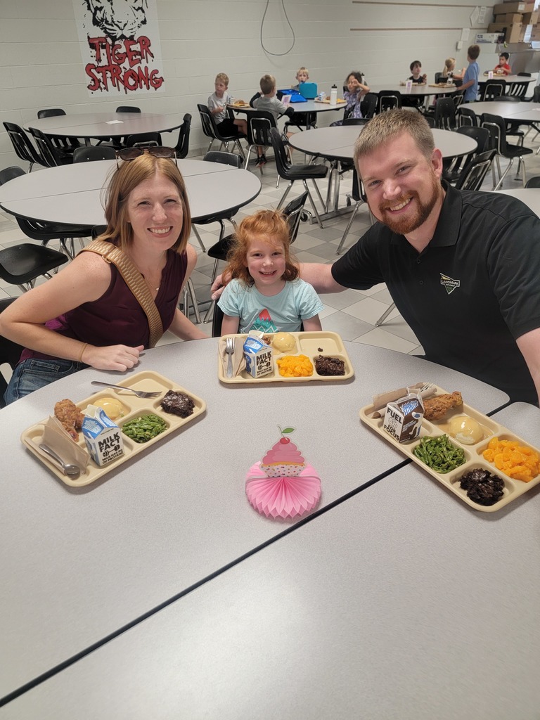 October birthday students with family and friends