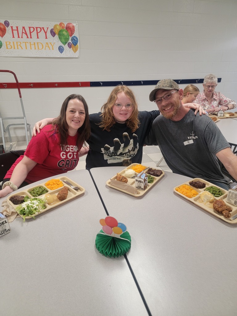 October birthday students with family and friends