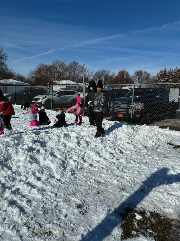 kids playing in the snow