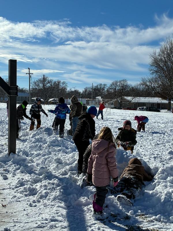 kids playing in the snow