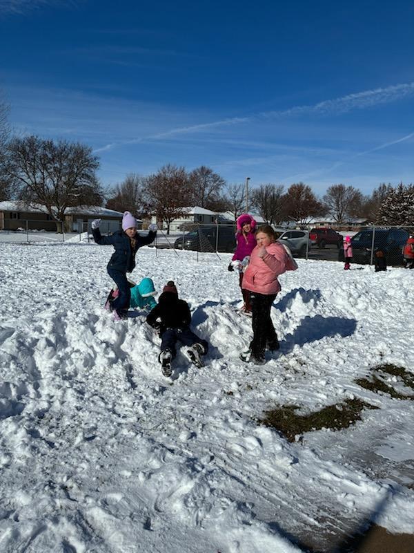 kids playing in the snow