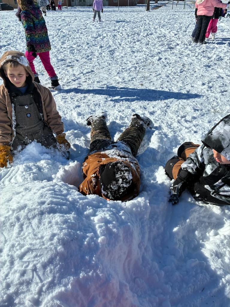 kids playing in the snow