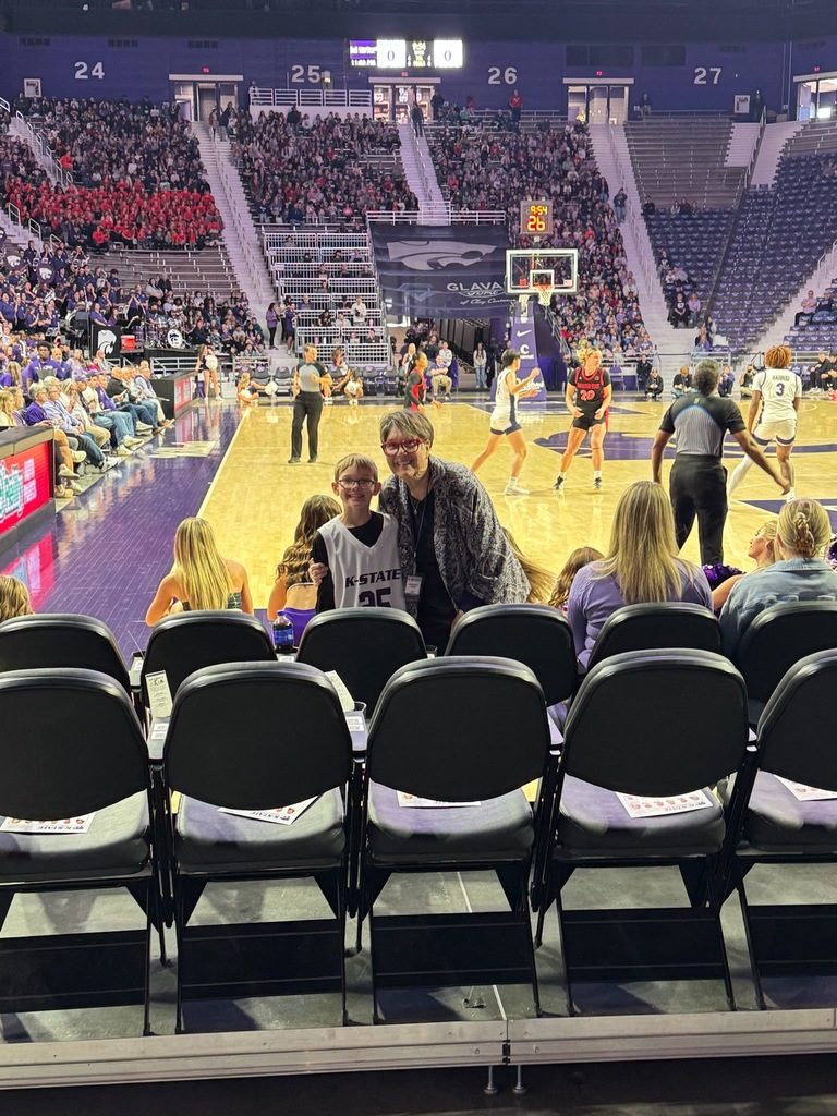 4th through 7th students at KSU women's basketball game