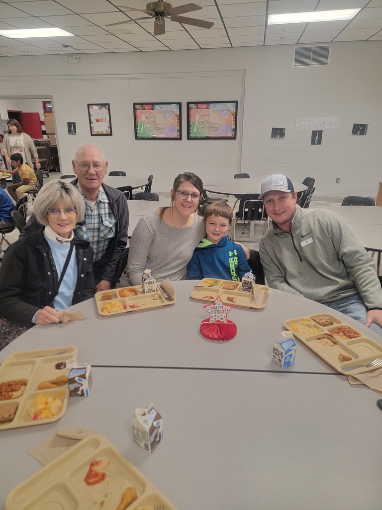 June birthday students with family