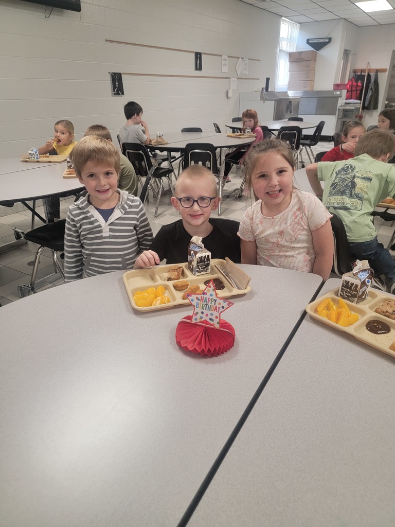 June birthday students with family