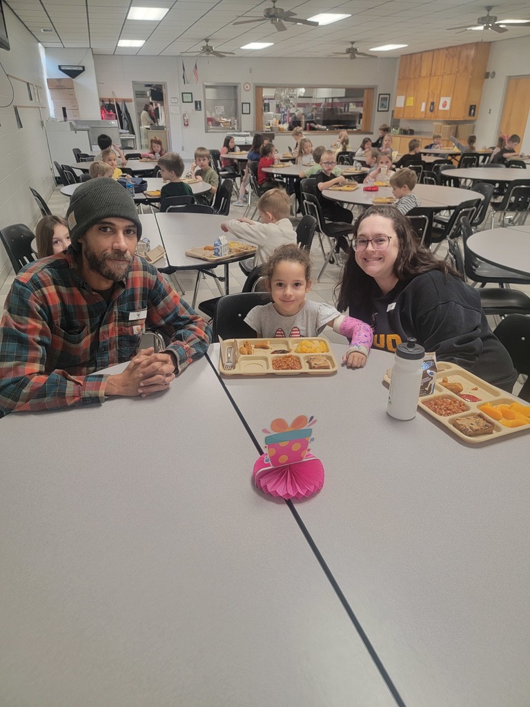 June birthday students with family