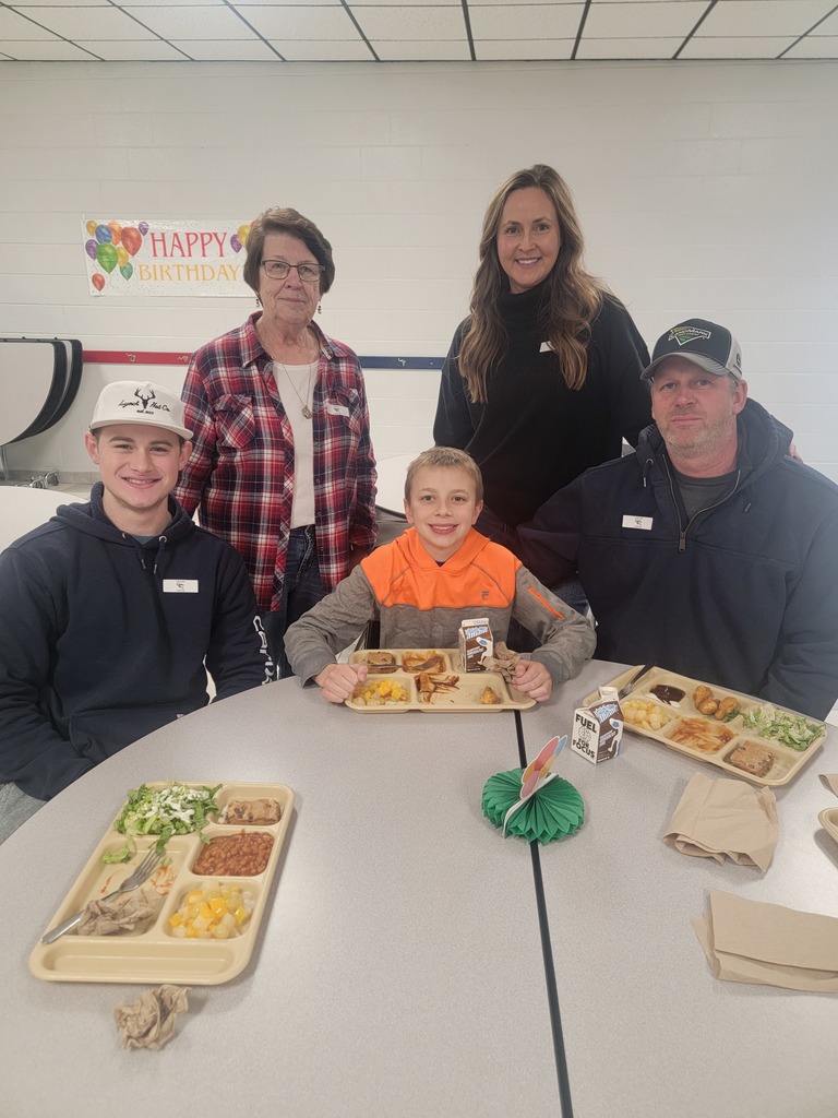 June birthday students with family