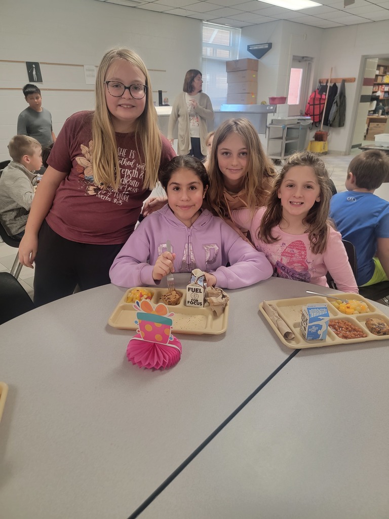 June birthday students with family