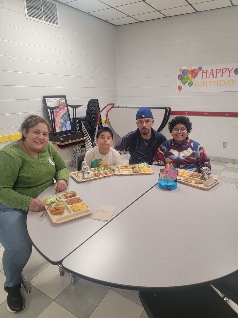 June birthday students with family