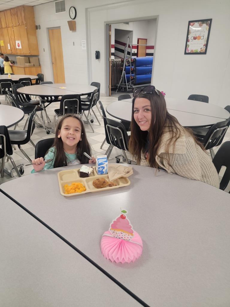 January birthday students eating lunch with family and friends.