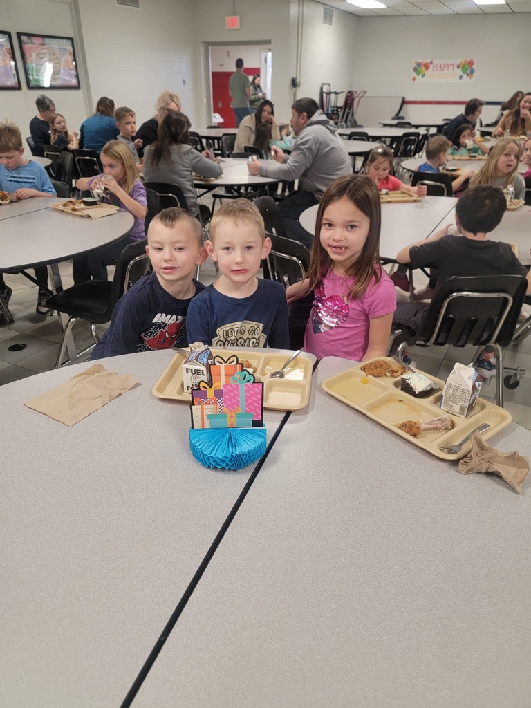 January birthday students eating lunch with family and friends.