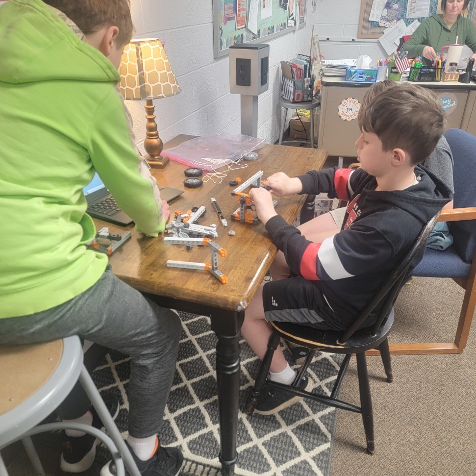 students working with Newton's Law