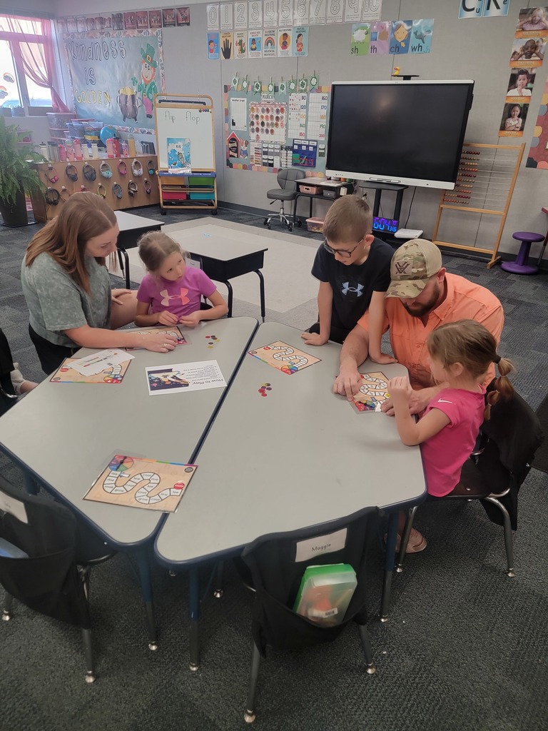 families doing reading activities