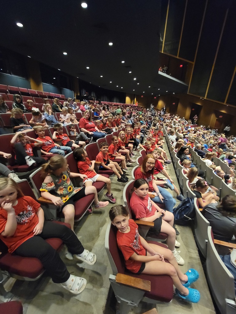 students sitting in chairs waiting for Bubble Trouble