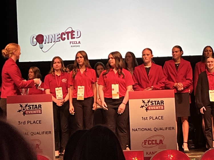 Emma and Amaya received silver medals on stage