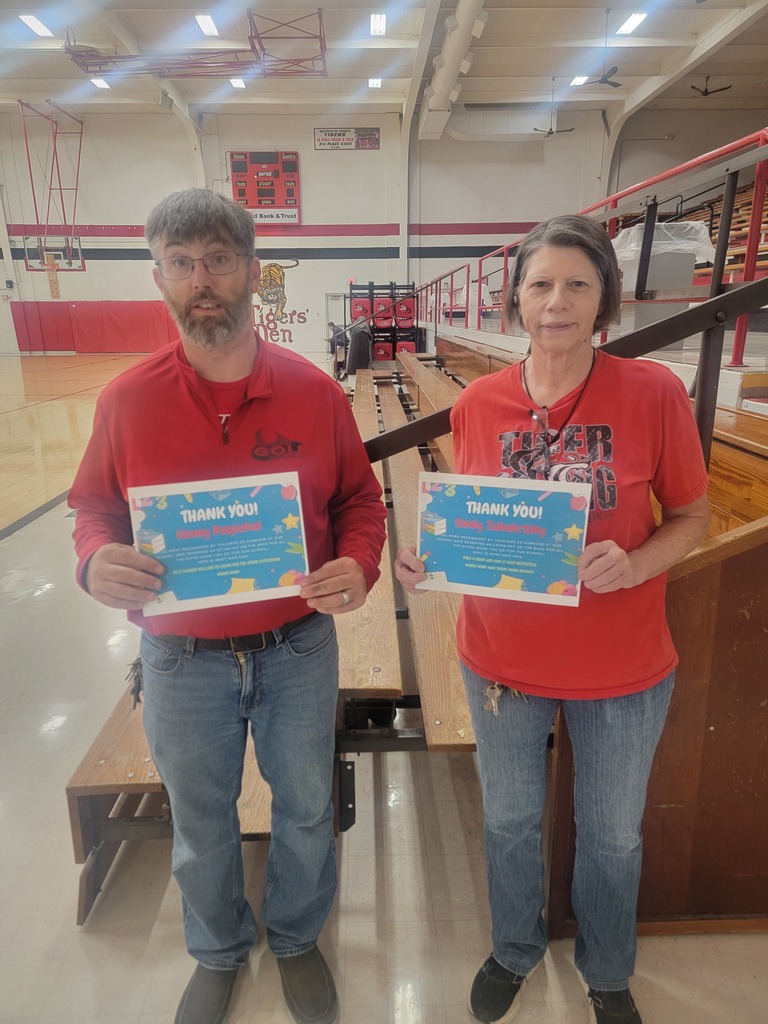Kenny Pospichal and Cindy Zabokrtsky holding certificate