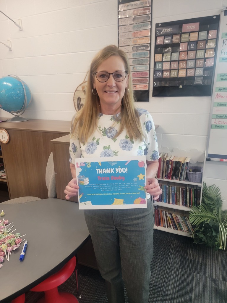 Tricia Gauby holding certificate