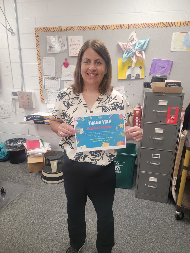 Heather Gepner holding certificate