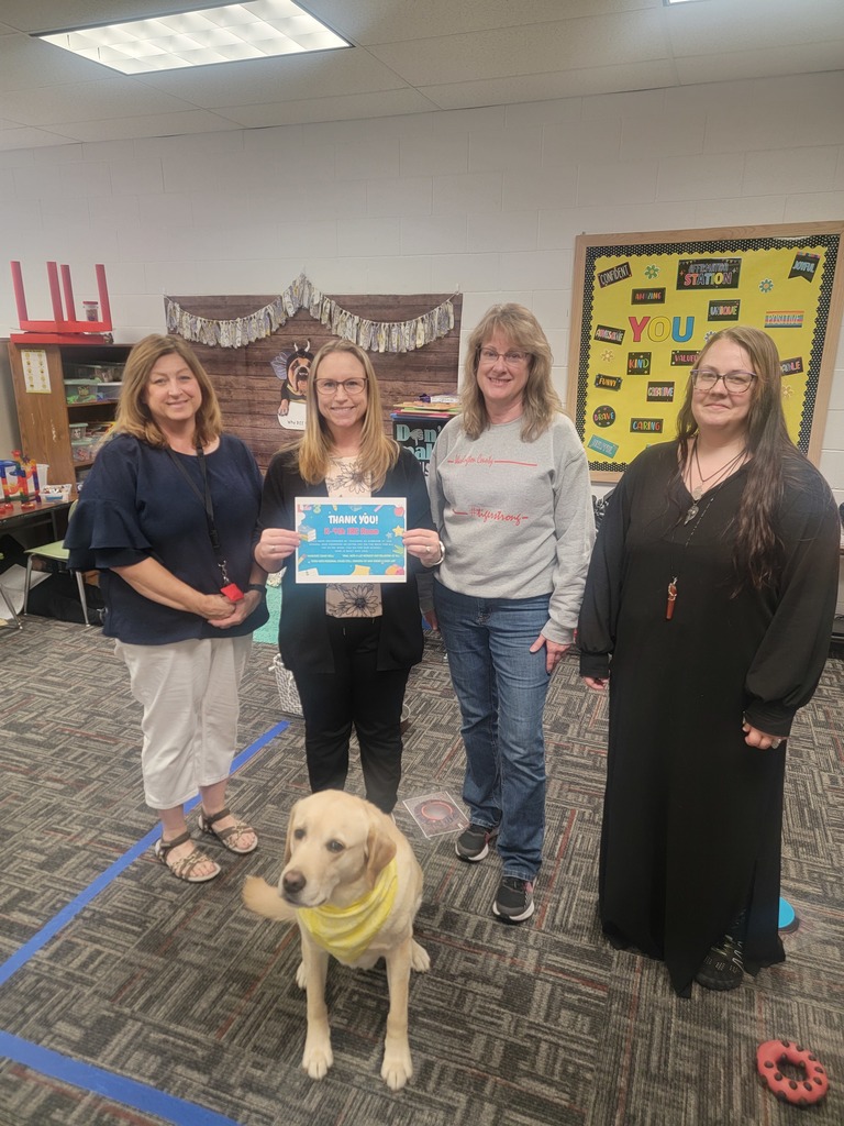 K-4 Special Education team holding certificate